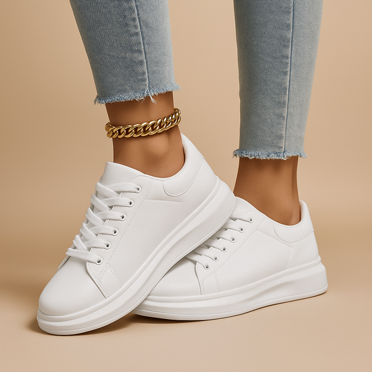 Vita lädersneakers med minimalistisk design för kvinnor | Jinte